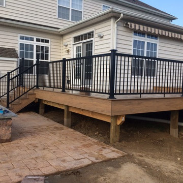 Timbertech legacy deck with aluminum rails with lighted post caps.