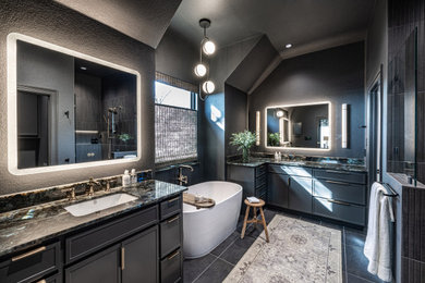 Inspiration for a mid-sized contemporary black tile and porcelain tile slate floor, black floor and double-sink bathroom remodel in Dallas with recessed-panel cabinets, black cabinets, a bidet, black walls, an undermount sink, quartz countertops, a hinged shower door, black countertops and a built-in vanity