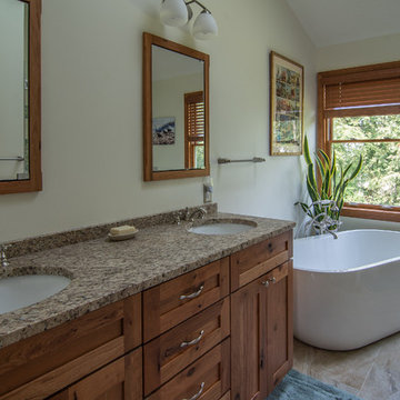Master bath featuring a rustic character cherry vanity cabinet