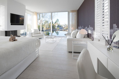 Medium sized contemporary guest bedroom in Other with grey walls, light hardwood flooring and white floors.