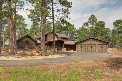 Large rustic brown two-story wood exterior home idea in Denver with a shingle roof