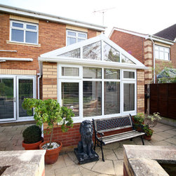 White Conservatory with PVCu Bi-Fold Doors - Products