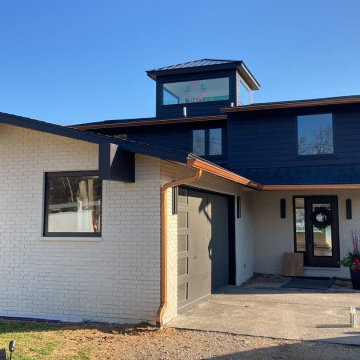 Modern Exterior Transformation with Metal Roofing & James Hardie Siding in Highl