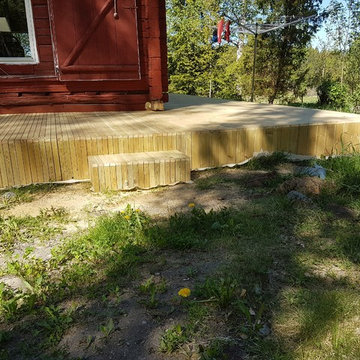 Entré av trall med solfjäder.