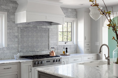 Inspiration for a timeless kitchen remodel in Seattle with shaker cabinets, white cabinets and marble countertops