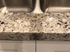 The Granite Gurus: FAQ Friday: Granite Countertop Over a Washer