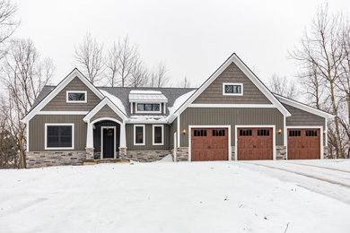 Rustic exterior home idea in Grand Rapids