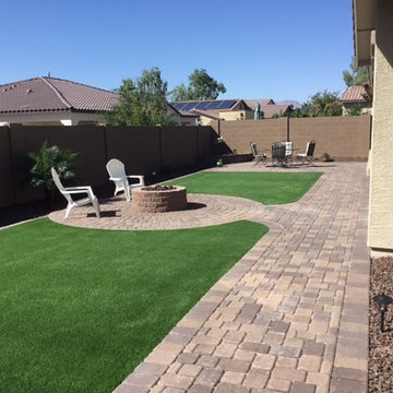 Custom water features, pavers, pergolas, turf