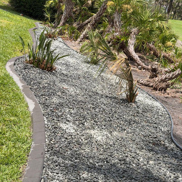 Elegant Landscape Renovation & Decorative Rock Installation