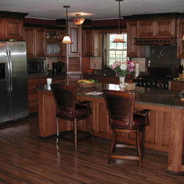 Maple stained cabinets with darker crown molding
