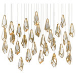 Currey & Company - Glace 30-Light Multi-Drop Pendant - The faceted shades of the Glace 30-Light Multi-Drop Pendant are made of panes of Raj mirror joined with seams of metal in a brass finish. The organic shape of the shades and the fact they hang at differing heights brings this mirrored pendant added personality that will make it a piece of jewelry in a space. This fixture is among Currey & Company's introduction of cluster lights, which includes 1-light up to 36-light configurations.