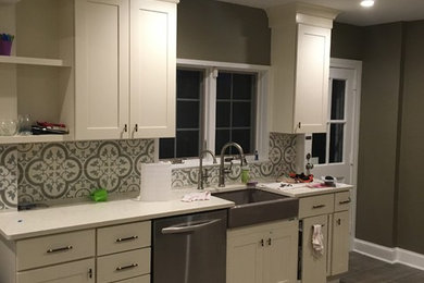 Example of a transitional kitchen design in New York