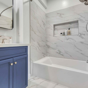 Irvine Bathroom Remdoel with Elegant Blue Vanity & Marble-Inspired Tile