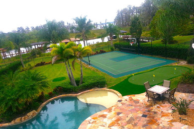 Mid-sized traditional backyard partial sun outdoor sport court in Orlando.