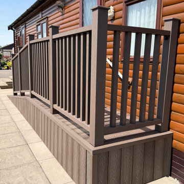 Dark Composite Balustrade and Gate on a Lodge Veranda