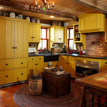 New Jersey Restored Farm House with a Primitive Mustard Kitchen