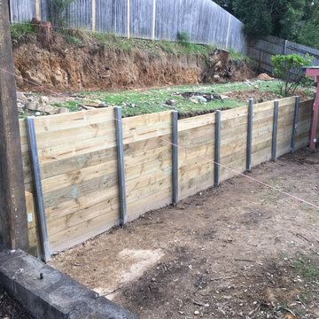 Timber retainers are the most cost effective and structurally very sound.
