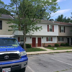 Old 3-Tab Shingle Removal on Entire Apartment Complex - Roofing And Gutters