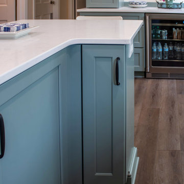 Custom Two-Toned Green and White Kitchen with Laventa Carrara Quartz Countertops