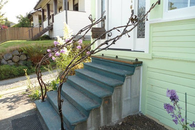 Inspiration for a mid-sized entryway remodel in Seattle with a white front door