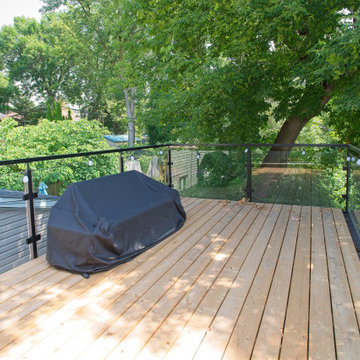 Upper Wood Deck with Black Railing and Leafy Neighbourhood Views | East York