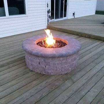 Two-level pressure treated deck with fire pit in southwest Fort Wayne