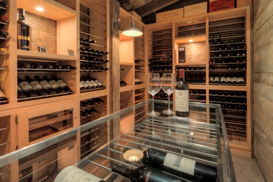 Wine cellar - mediterranean wine cellar idea in Miami