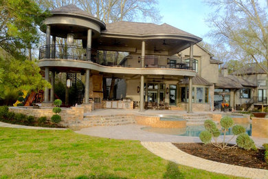 Inspiration for a timeless porch remodel in Houston with a roof extension