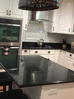 Backsplash for new white kitchen with black granite