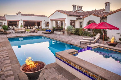 Example of a tuscan exterior home design in San Diego