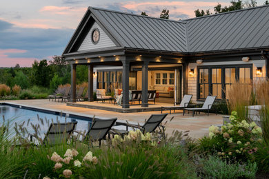 Example of a transitional exterior home design in Boston