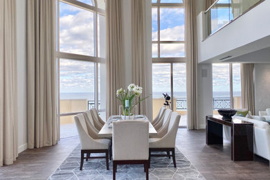 Inspiration for a transitional dining room remodel in Miami