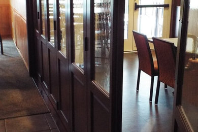 Example of a tuscan ceramic tile great room design in Other with beige walls