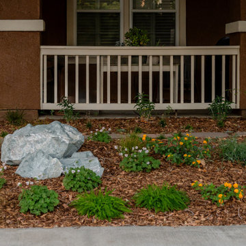 Colorful Front Yard Planting Bed with Boulder Accents