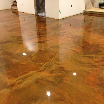 Epoxy metallic pigment on concrete floor in basement