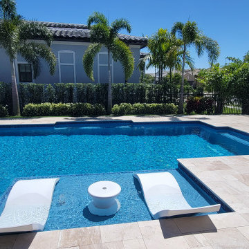 Parkland Modern Tropical Backyard with Palm Trees & Turf