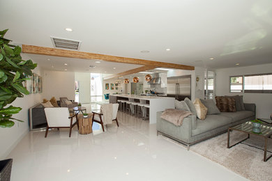 Large 1950s formal and open concept white floor living room photo in Los Angeles with white walls and no tv