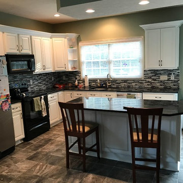 cabinet refacing--white with backsplash and new granite countertops