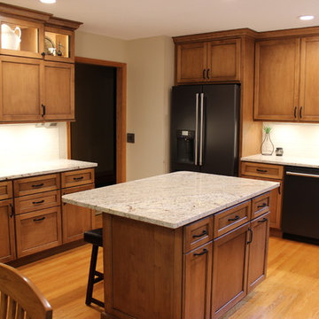 Maple Kitchen With Black and Gold Accents