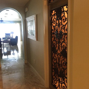 Convert a walk-in closet and utility room into a wine cellar