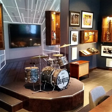 Guitar Display Cabinetry and Drum Riser In Walnut Burl
