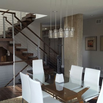 Open riser stairs with stainless steel cable wire railing