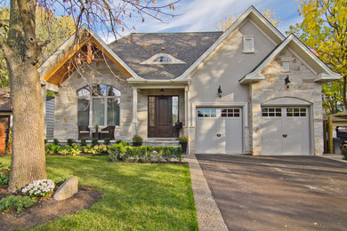 Example of a classic one-story exterior home design in Toronto