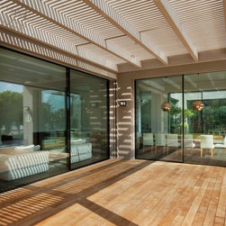 Contemporary Home with Invisible Sliders - Windows And Doors