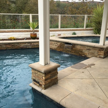 Dalton residence. Colored sand finish decking, Pour & place coping