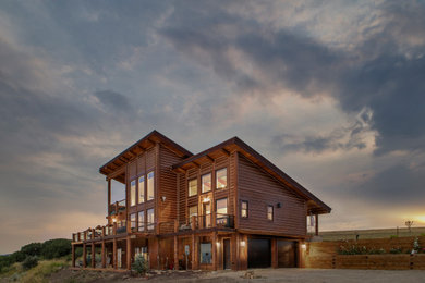 Rustic exterior home idea in Denver