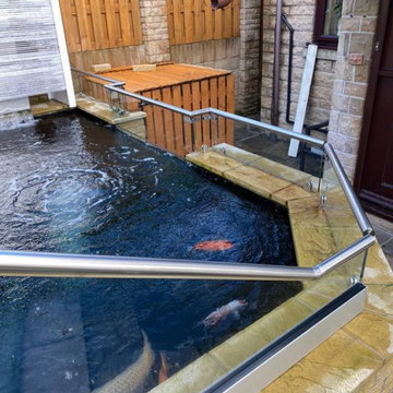 Glass Balustrade surrounding a Pond, in Sheffield