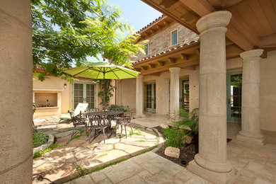 Patio - mediterranean courtyard patio idea in San Diego
