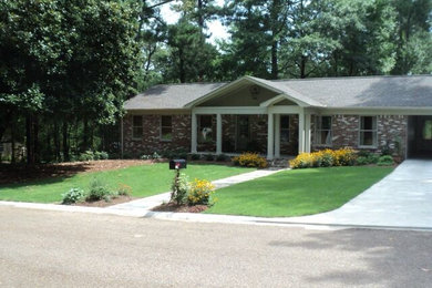 Inspiration for a small transitional beige one-story mixed siding gable roof remodel in Jackson