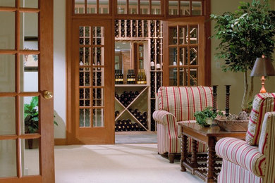 Wine cellar - traditional slate floor wine cellar idea in Philadelphia